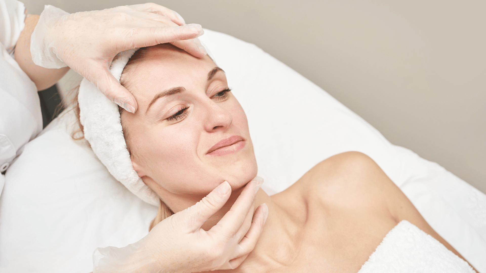 Woman getting facial treatment.