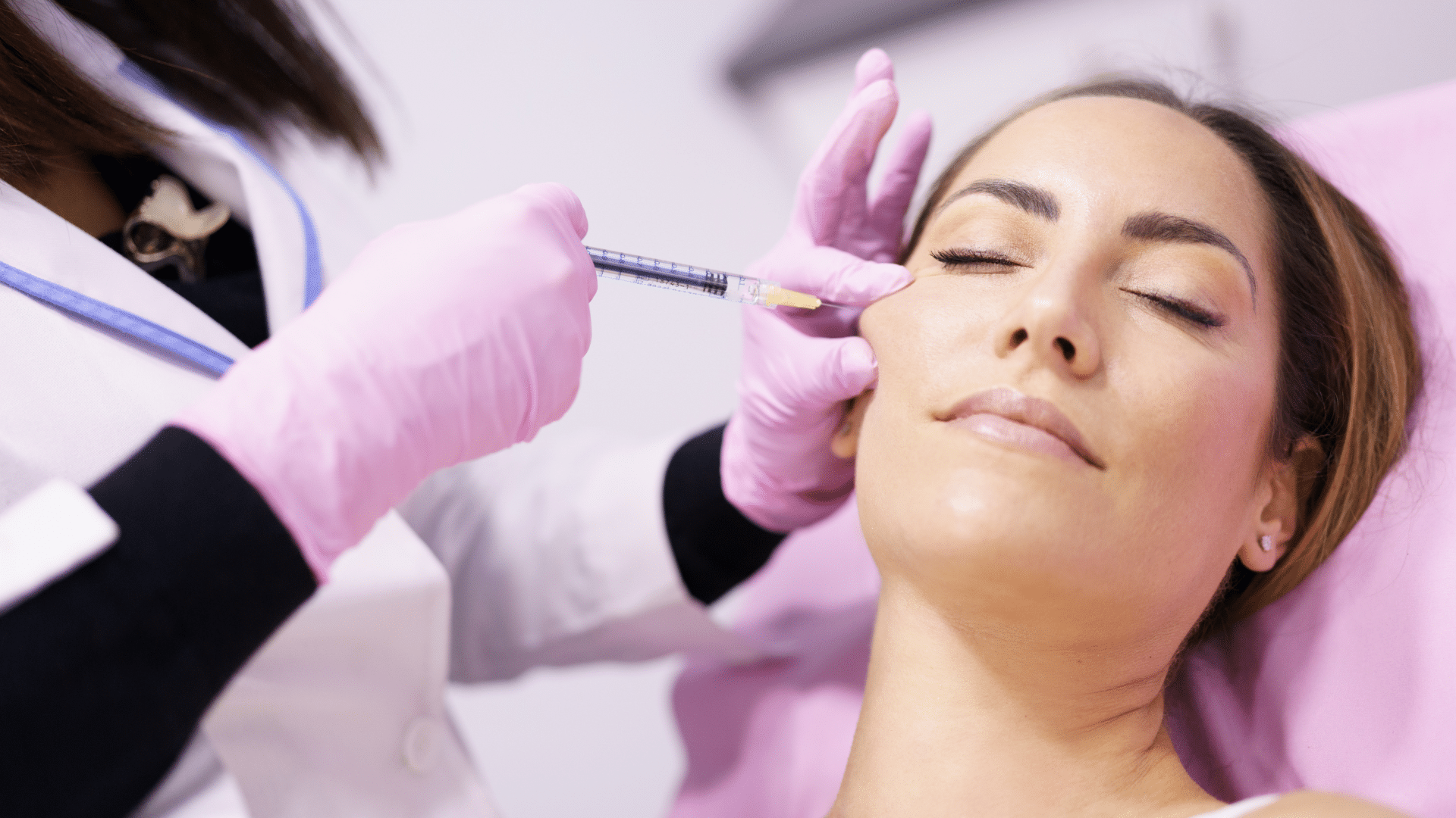 Woman getting facial treatment.