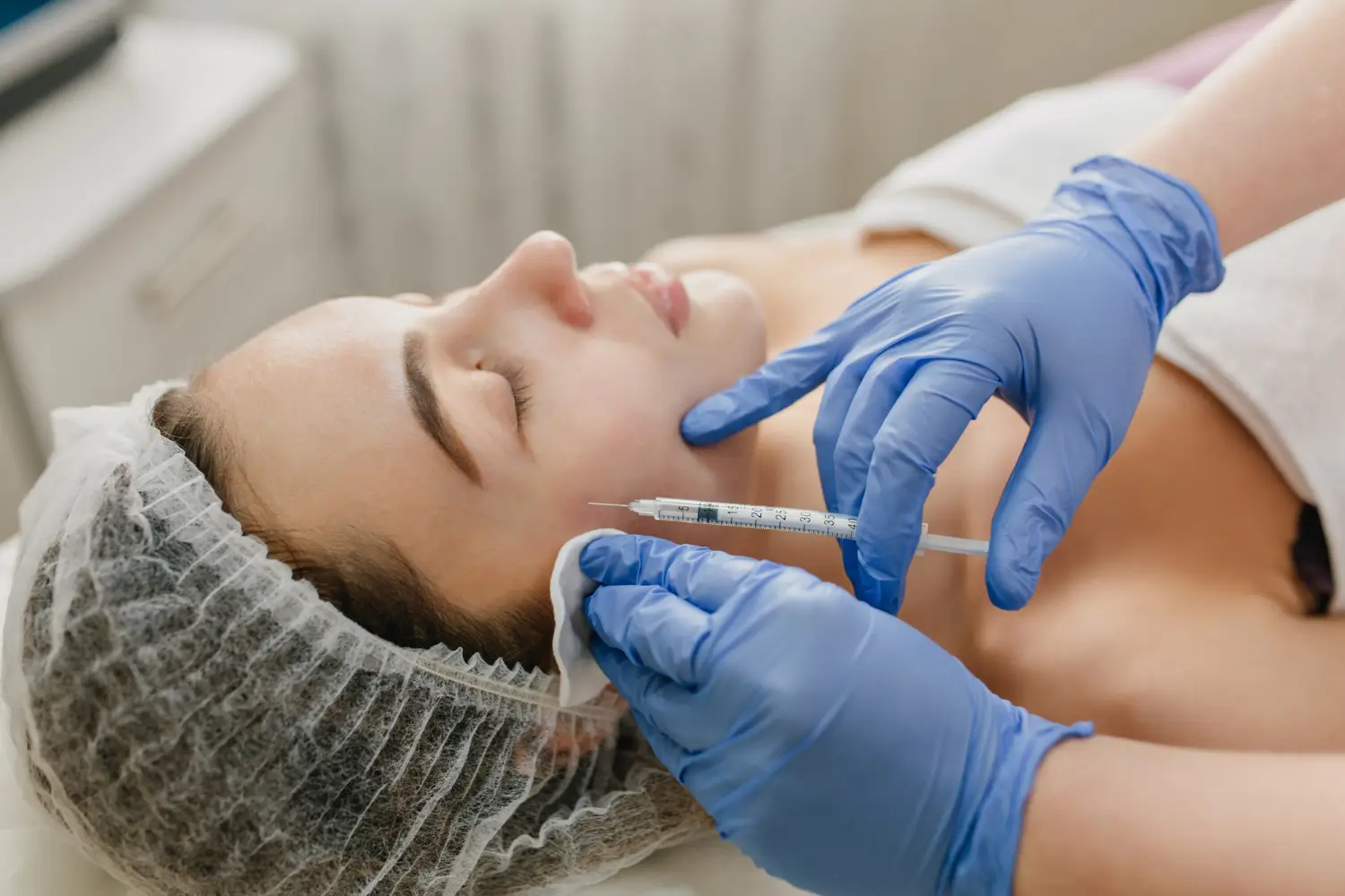 Patient receiving dermal filler treatment