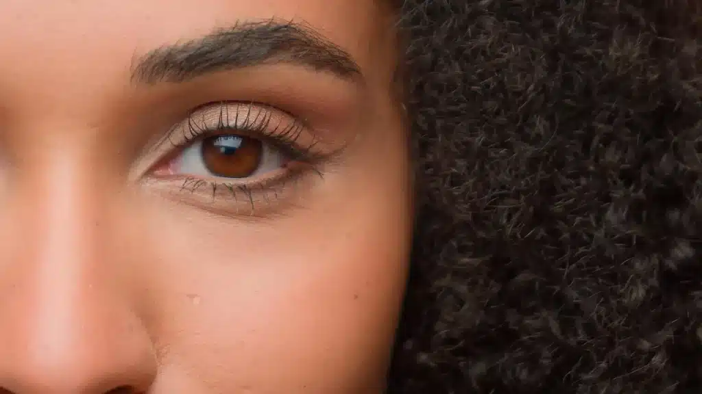 woman's eye looks lovely and young