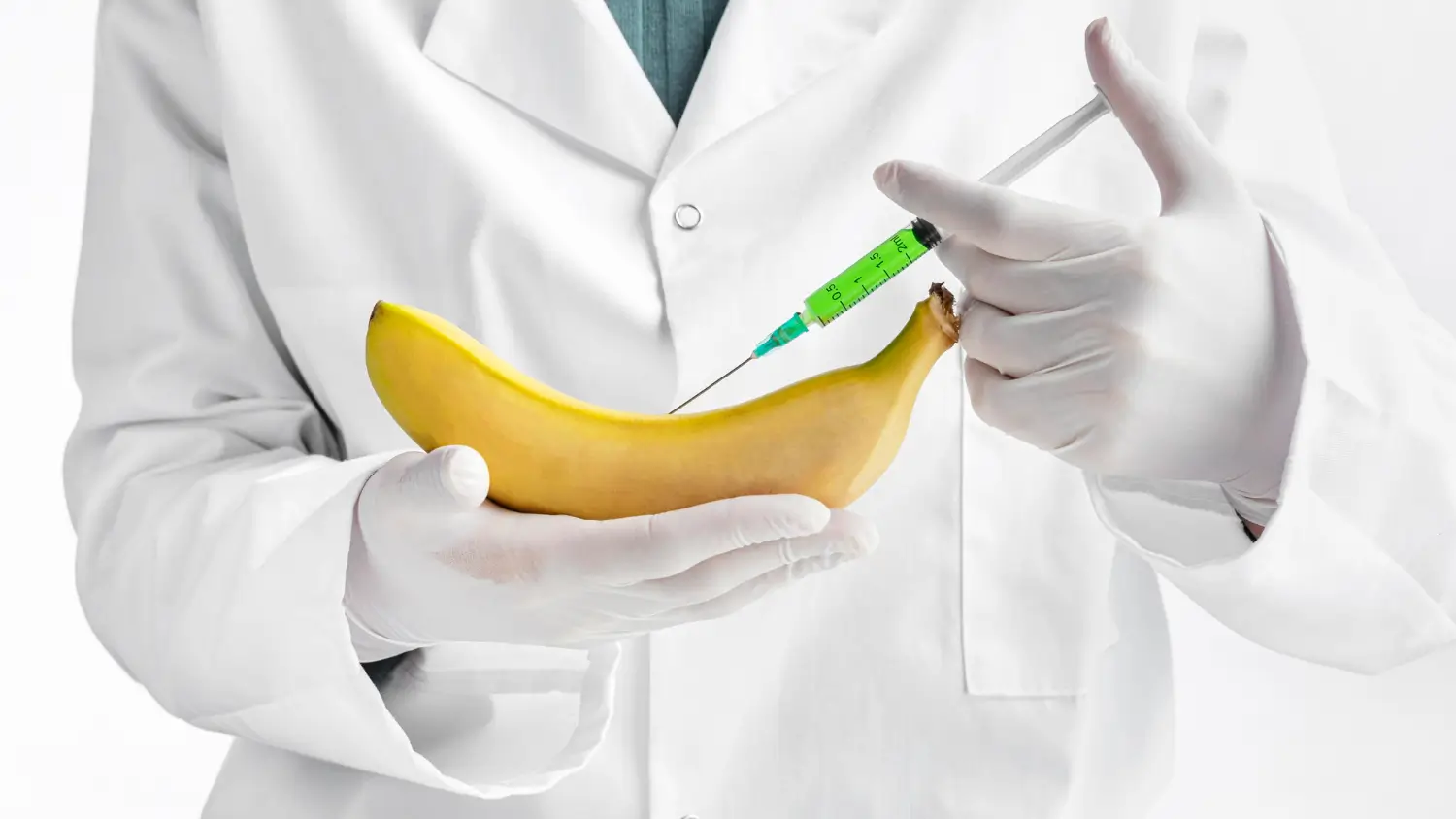 doctor injects a banana as a symbolism of male enhancement procedure