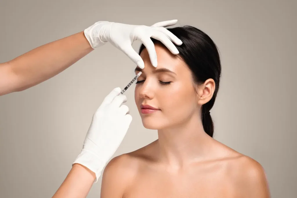 patient gets injection in the forehead