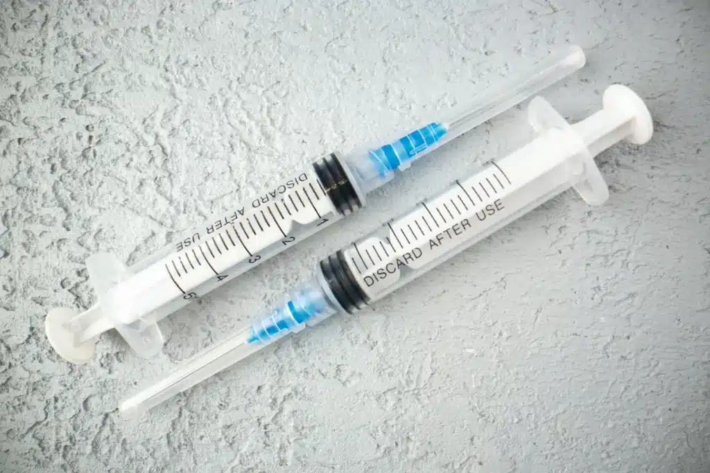 two syringes on the table for injection